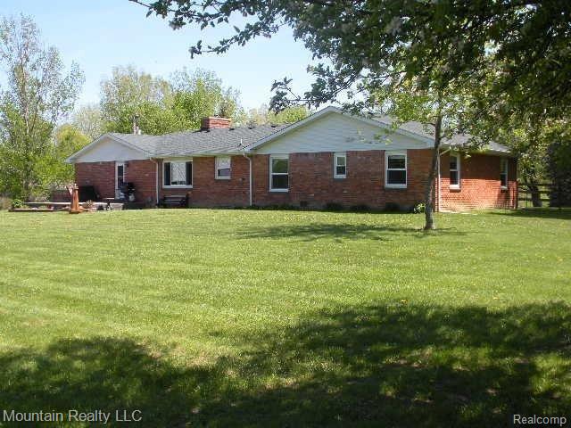 4661 Crawford Road Dryden, MI 48428 - Photo 3 of 20 REAR OF HOME.JPG