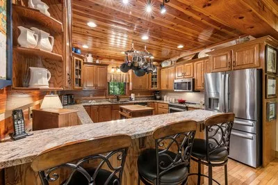 a view of a balcony with furniture and wooden floor