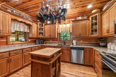a living room filled with furniture and a flat screen tv