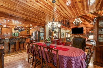 105 Double Branch Trail Murphy, NC 28906 - Photo 25 of 75 a view of a dining room with furniture and wooden floor