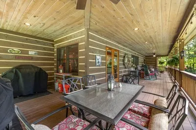 a bed room with furniture and a fireplace