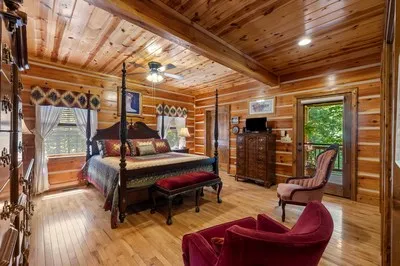 a bedroom with a bed gym equipment and view of living room
