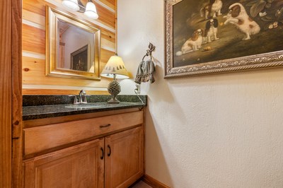 105 Double Branch Trail Murphy, NC 28906 - Photo 36 of 75 a bathroom with a granite countertop sink and a mirror