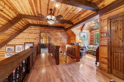105 Double Branch Trail Murphy, NC 28906 - Photo 39 of 75 a view of chairs and table in deck with wooden floor
