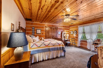 105 Double Branch Trail Murphy, NC 28906 - Photo 41 of 75 a bedroom with furniture and a window