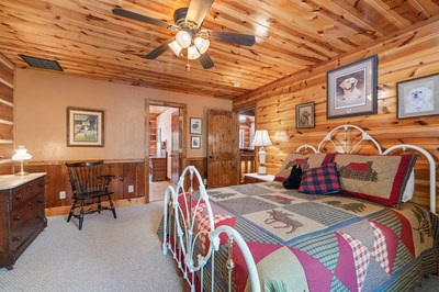 105 Double Branch Trail Murphy, NC 28906 - Photo 48 of 75 a bedroom with a bed gym equipment and view of living room