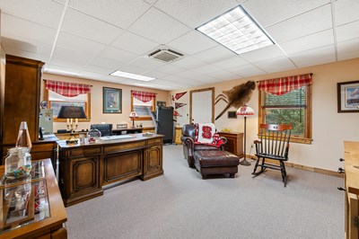 105 Double Branch Trail Murphy, NC 28906 - Photo 58 of 75 a living room with furniture a flat screen tv and a large window