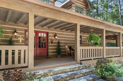 a view of entryway livingroom and hall with wooden floor