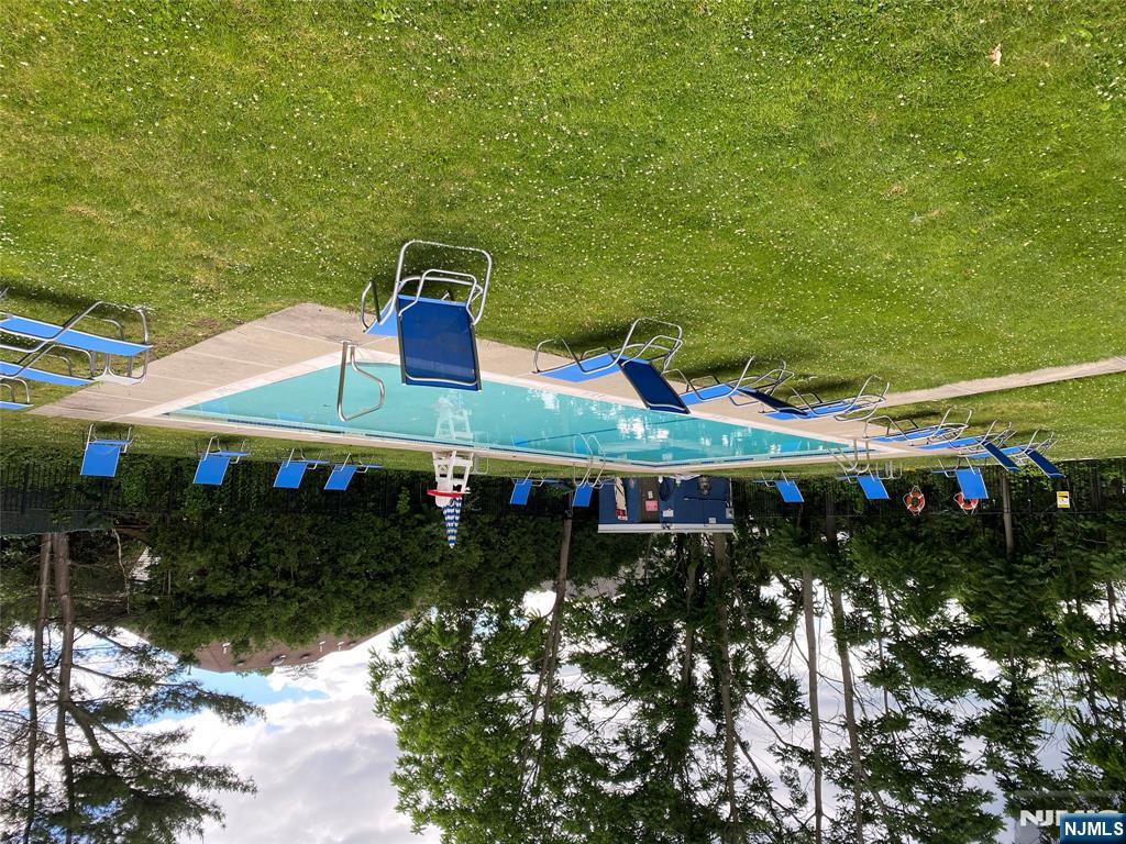 107 Bellgrove Drive, Unit 5A Mahwah, NJ 07430 - Photo 13 of 14 a view of a child park