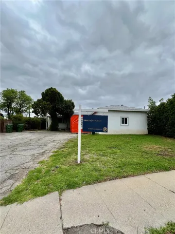 a view of a entryway door with wooden floor