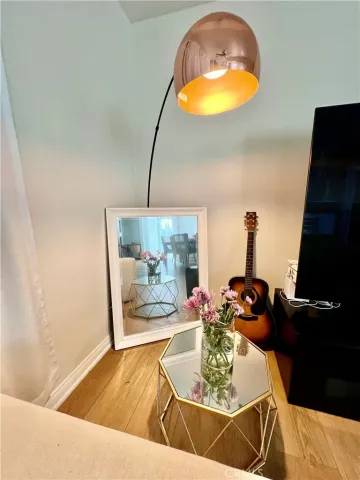 a living room with a table and chairs