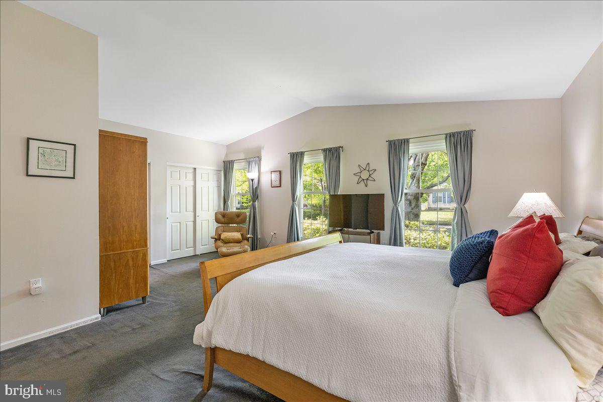 3 Strathmore Place Princeton Junction, NJ 08550 - Photo 17 of 29 a bedroom with a bed and dresser with wooden floor