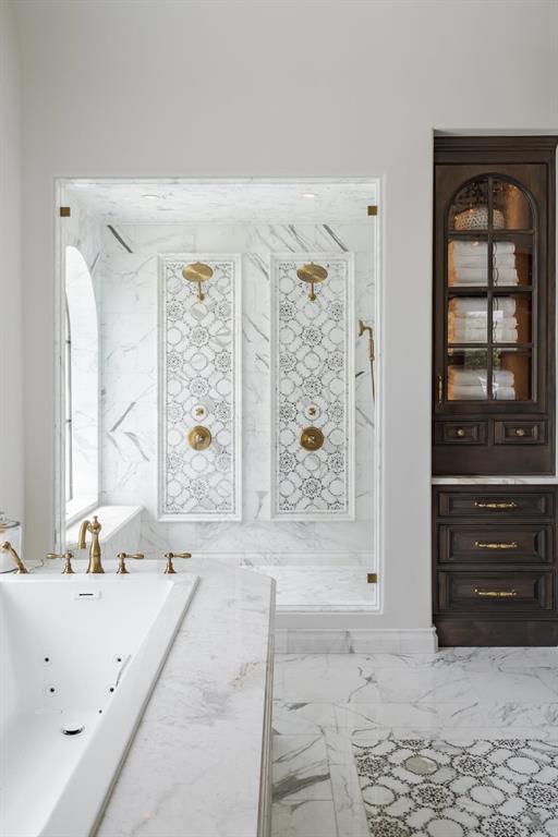 268 Dudley Street Frisco, TX 75033 - Photo 4 of 15 a bathroom with a bathtub and a sink