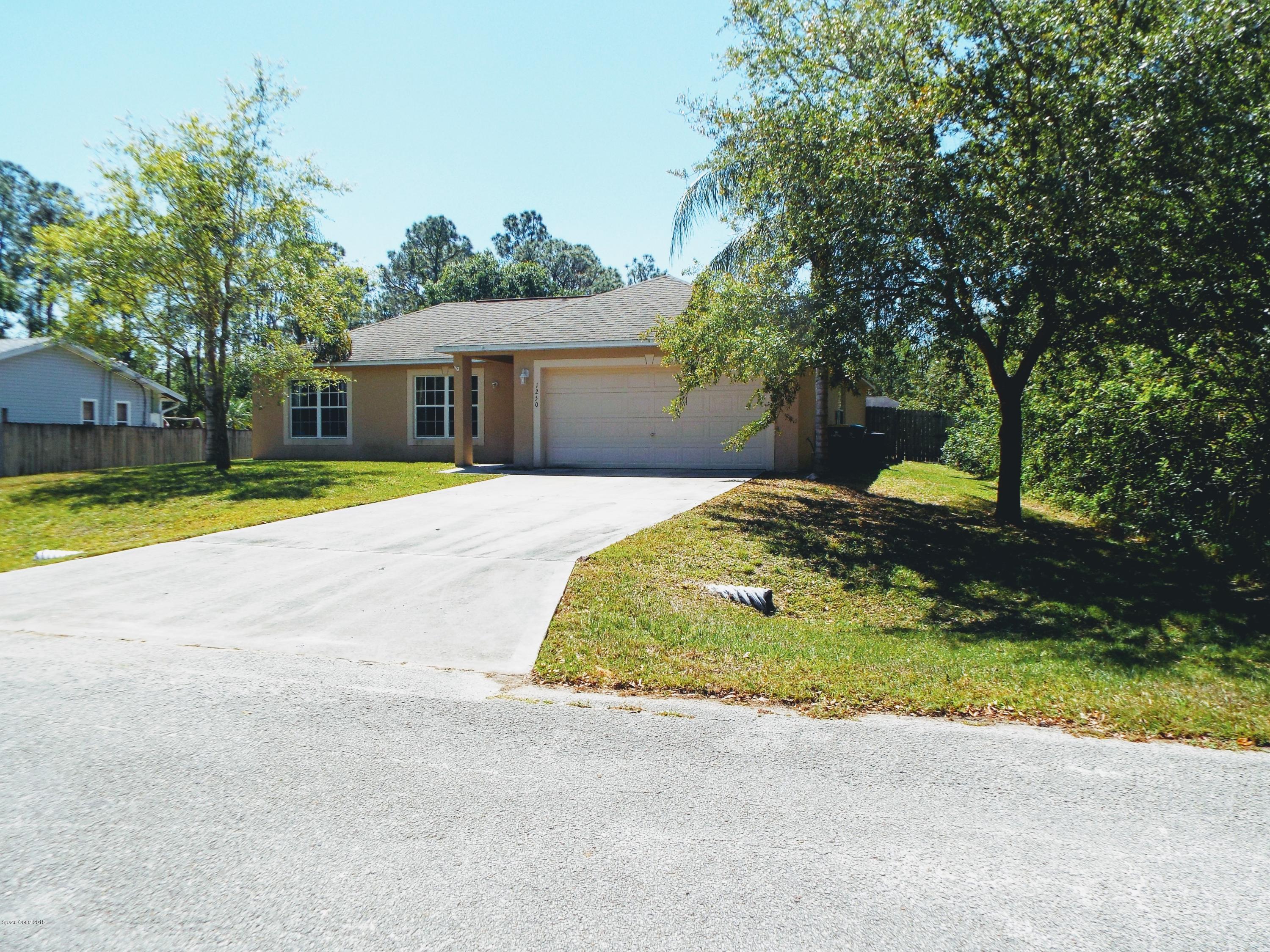 1250 Rainbow Road Southeast Palm Bay, FL 32909 - Photo 2 of 20 Front 2