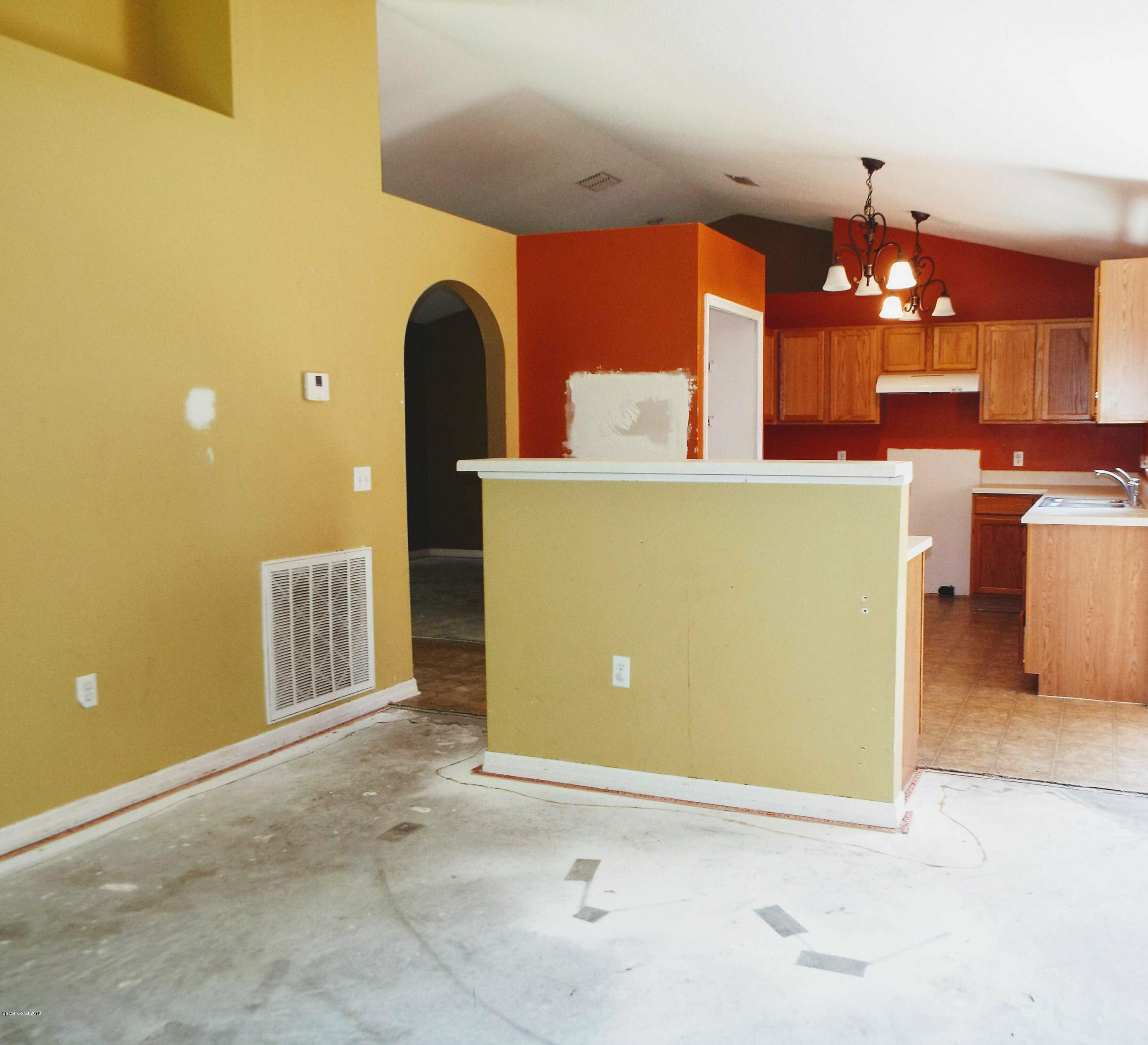 1250 Rainbow Road Southeast Palm Bay, FL 32909 - Photo 13 of 20 Family Room/Kitchen