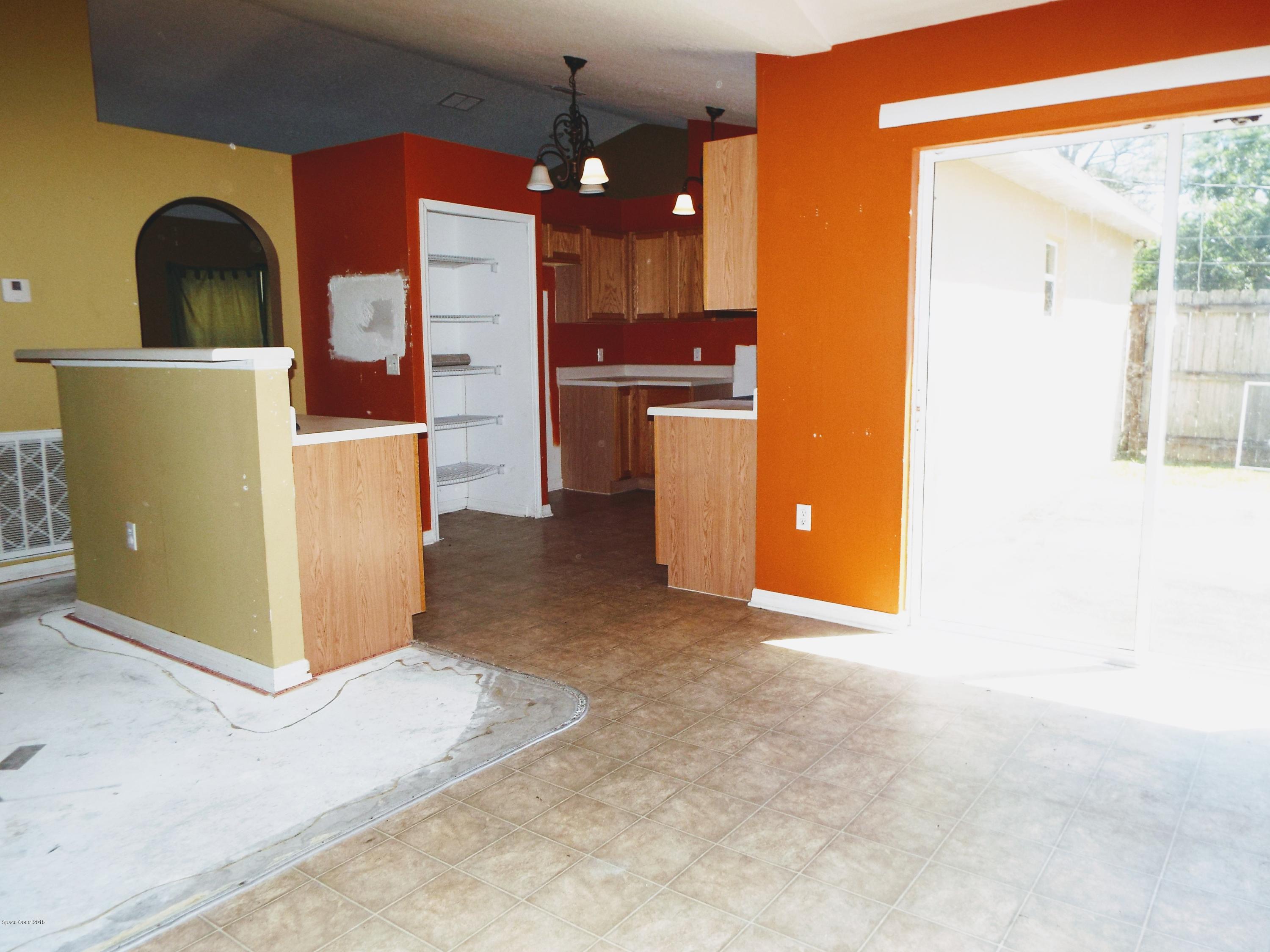 1250 Rainbow Road Southeast Palm Bay, FL 32909 - Photo 15 of 20 Dining Room/Kitchen
