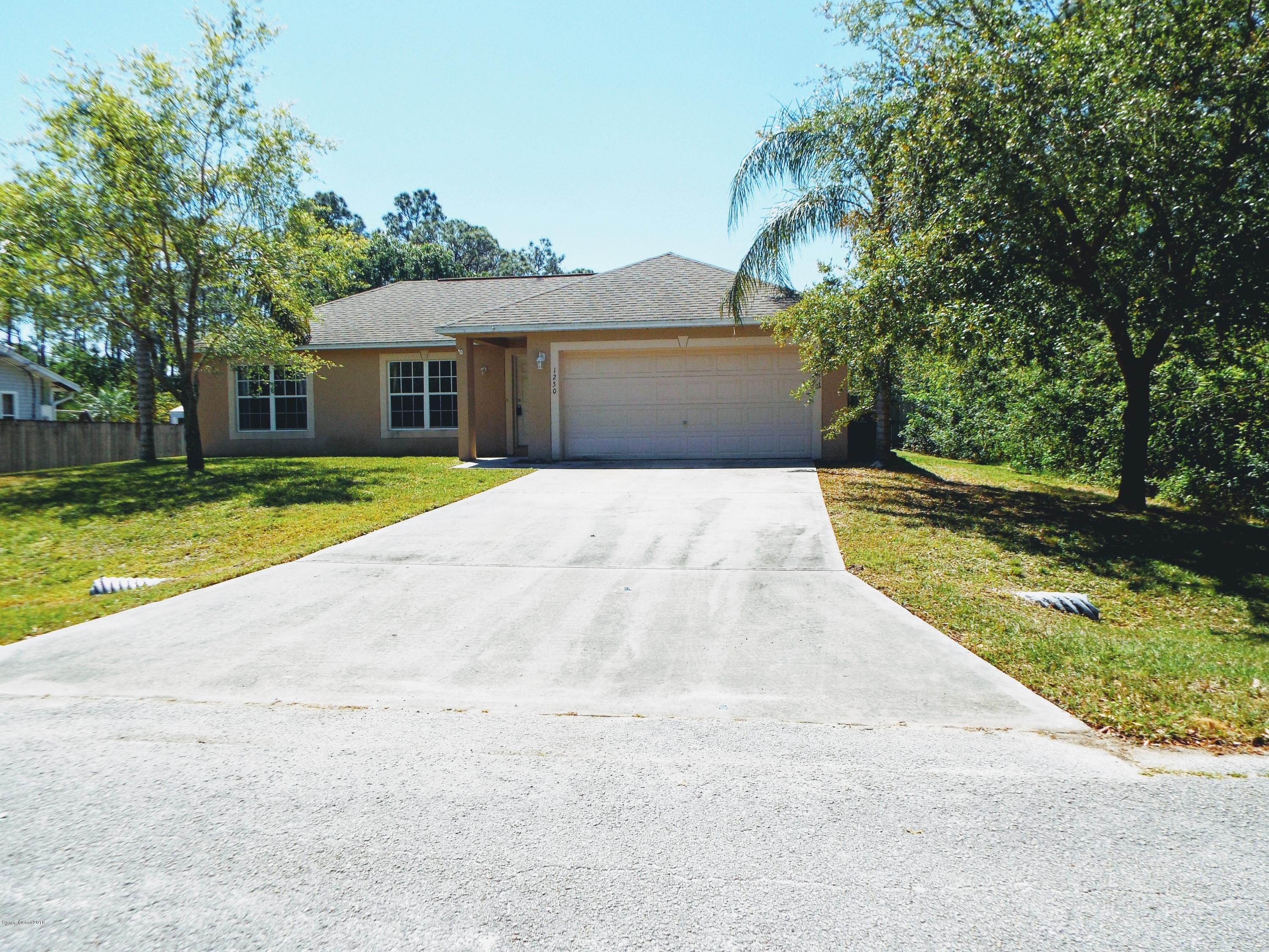 1250 Rainbow Road Southeast Palm Bay, FL 32909 - Photo 3 of 20 Front 3
