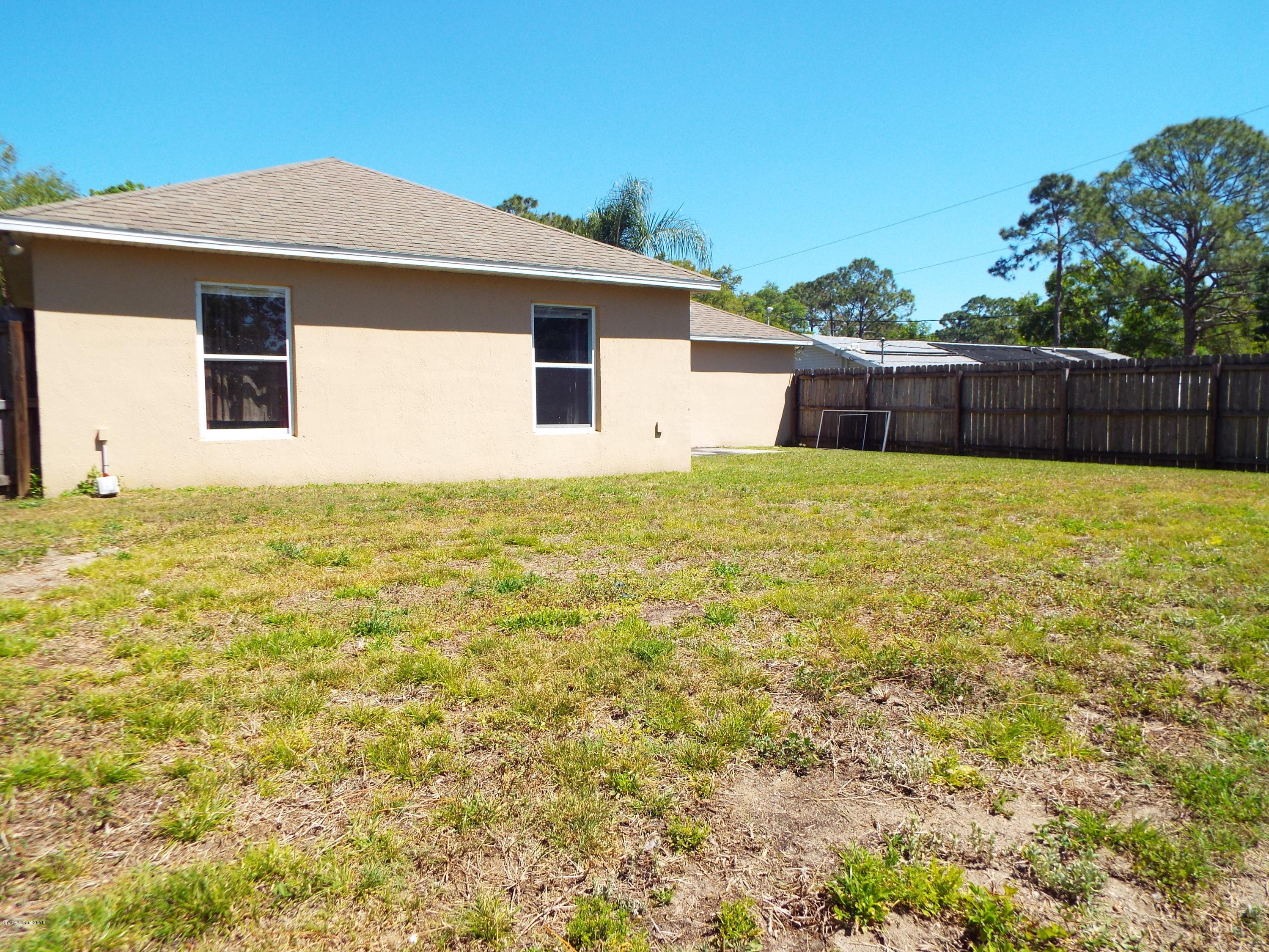 1250 Rainbow Road Southeast Palm Bay, FL 32909 - Photo 5 of 20 Backyard 2