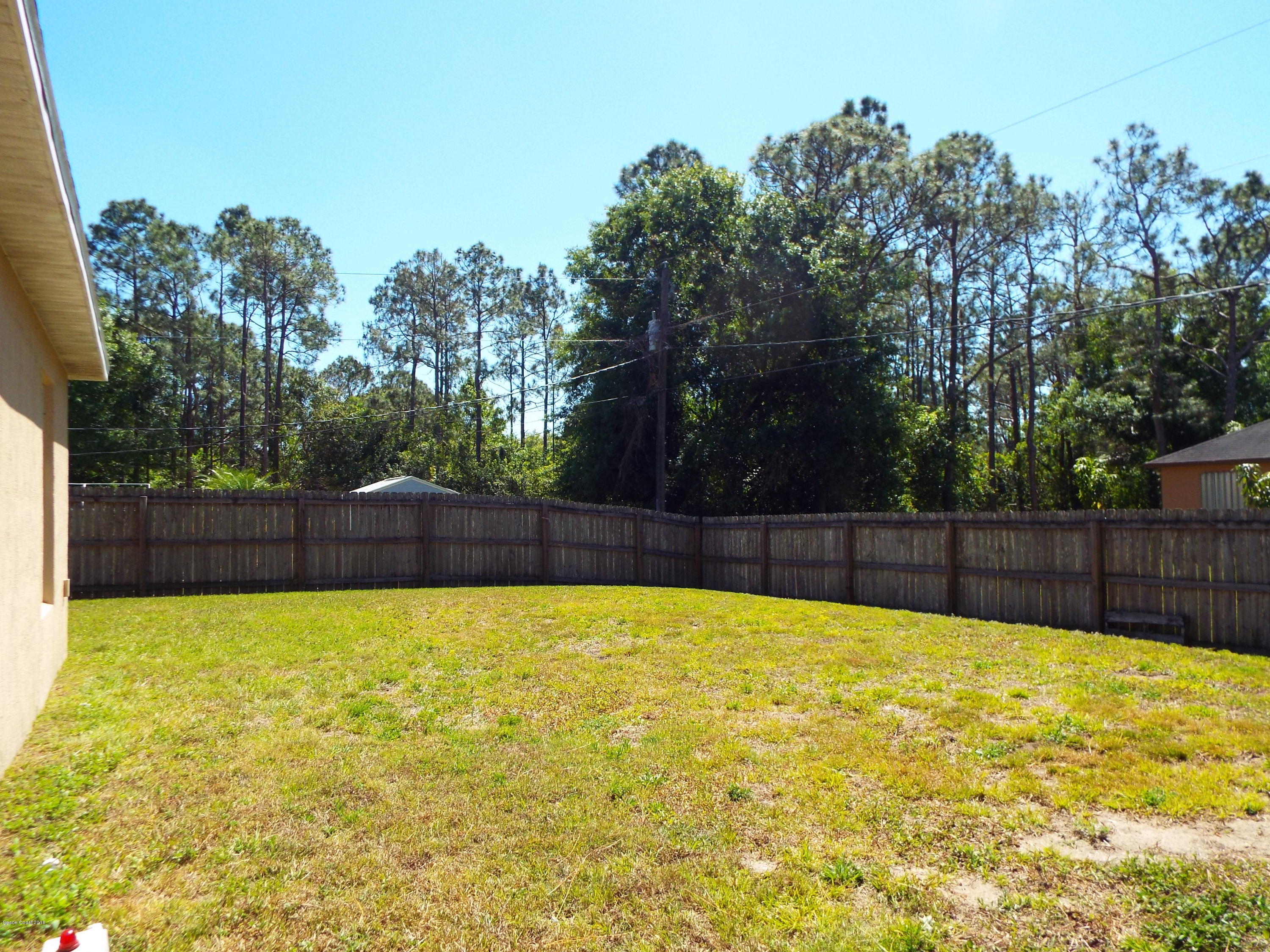 1250 Rainbow Road Southeast Palm Bay, FL 32909 - Photo 6 of 20 Backyard 3