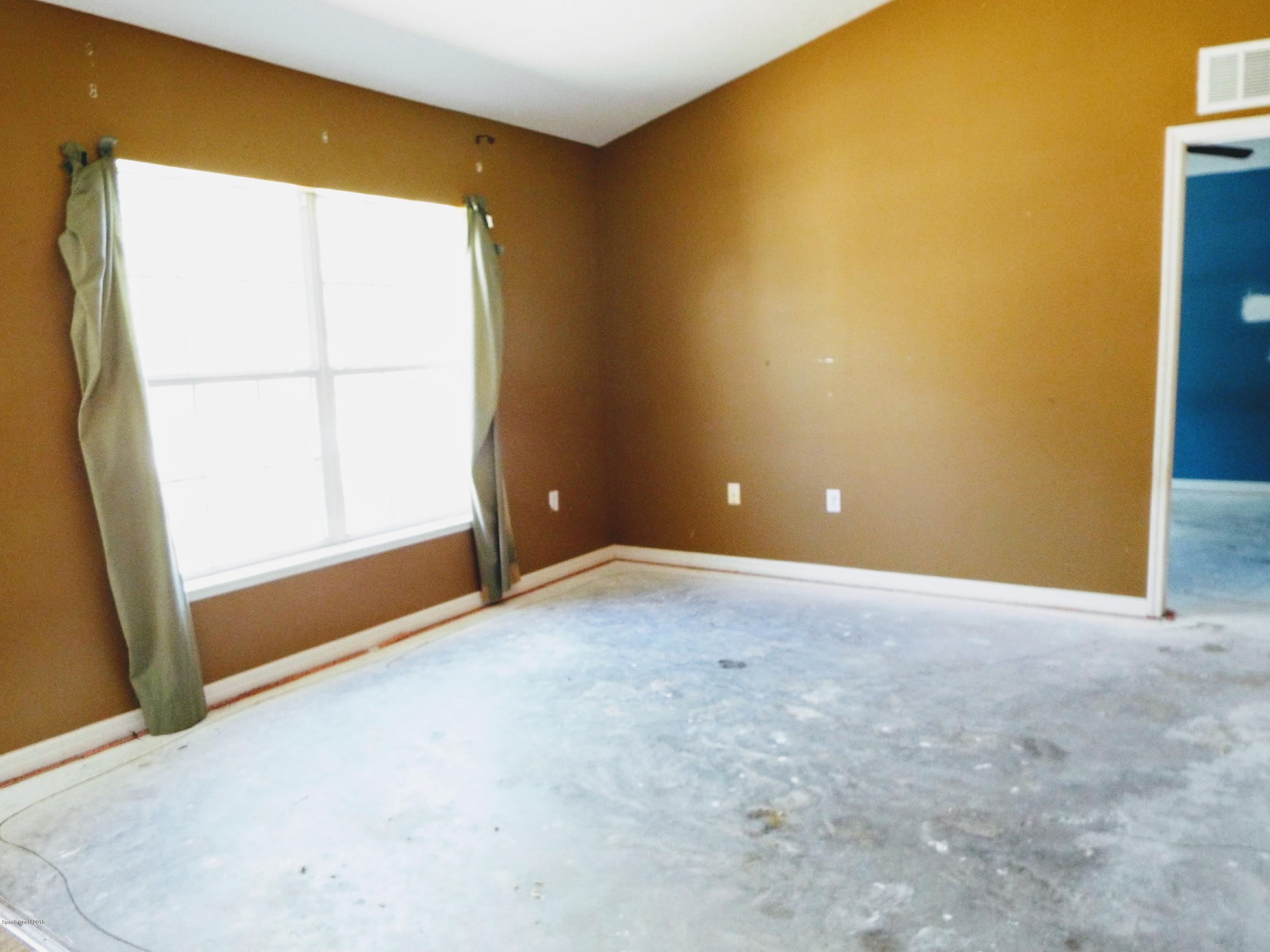 1250 Rainbow Road Southeast Palm Bay, FL 32909 - Photo 9 of 20 Formal Living Room 2