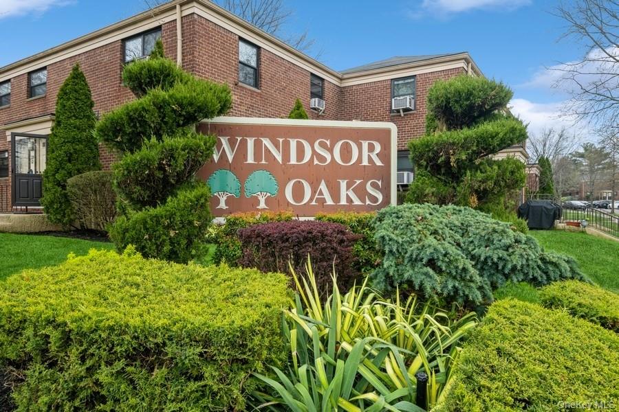 73-21 220th Street, Unit 139B2 Queens, NY 11364 - Photo 20 of 35 a sign on the side of a building