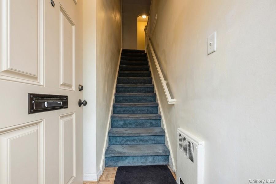 73-21 220th Street, Unit 139B2 Queens, NY 11364 - Photo 4 of 35 a view of entryway and hall with wooden floor