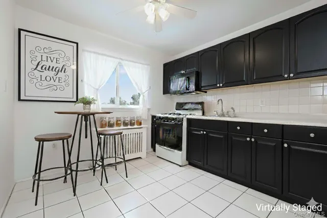 a kitchen with stainless steel appliances a cabinets and a sink