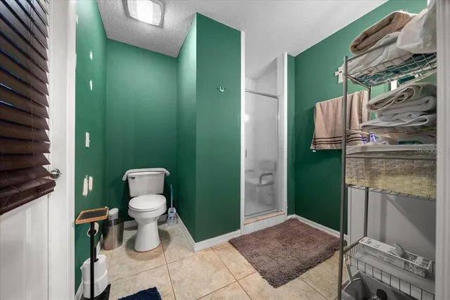 a kitchen with cabinets and window