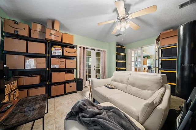 a kitchen with stainless steel appliances granite countertop a stove top oven a sink a counter space and cabinets