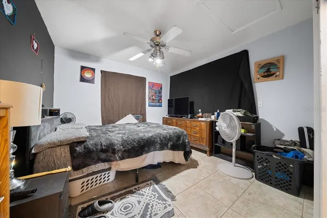 a large kitchen with a large counter top space and stainless steel appliances