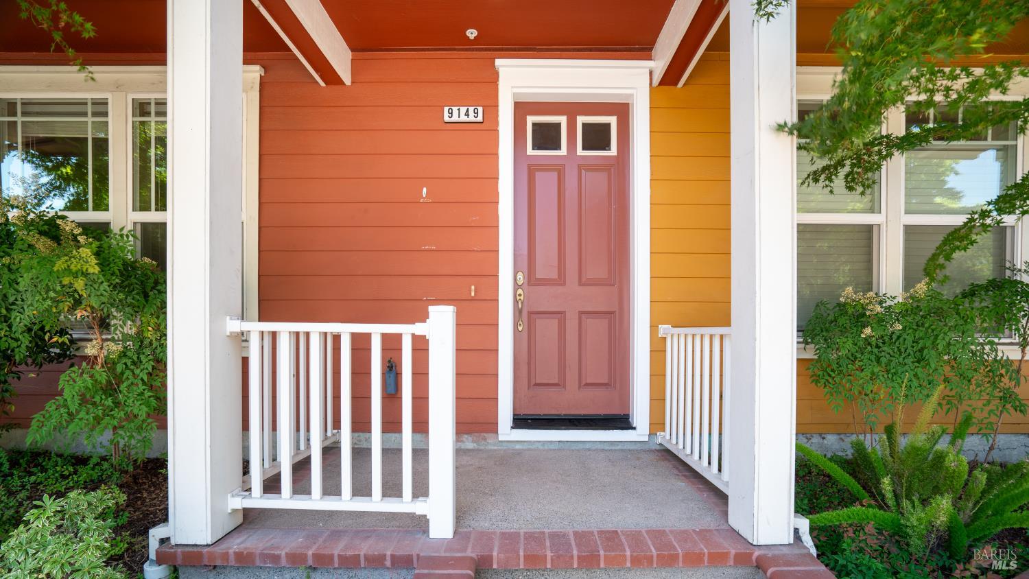 a view of a porch with a backyard