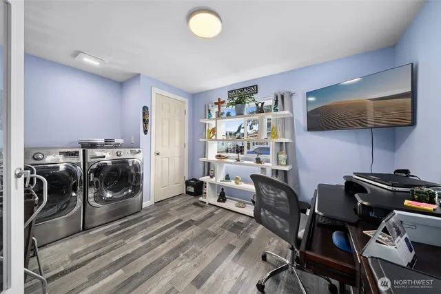 a bedroom with a workspace