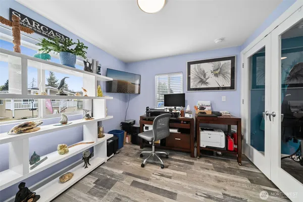 a view of a workspace with furniture