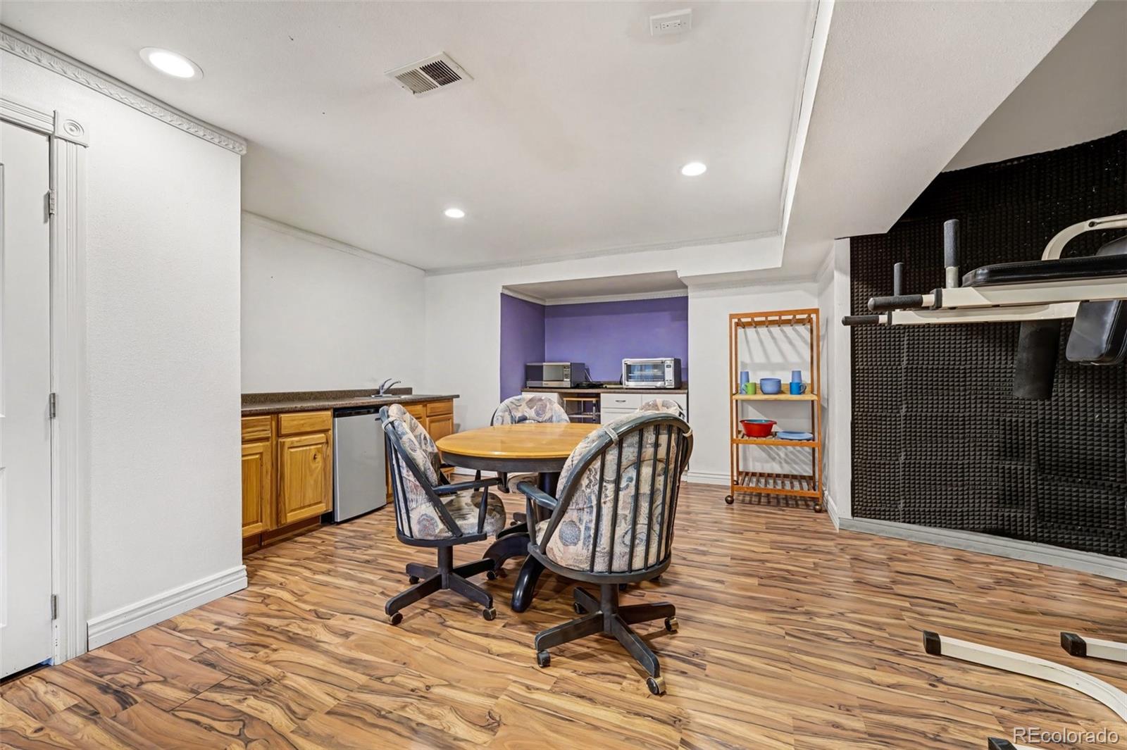 6650 North Village Road Parker, CO 80134 - Photo 32 of 46 a view of a dining room with furniture