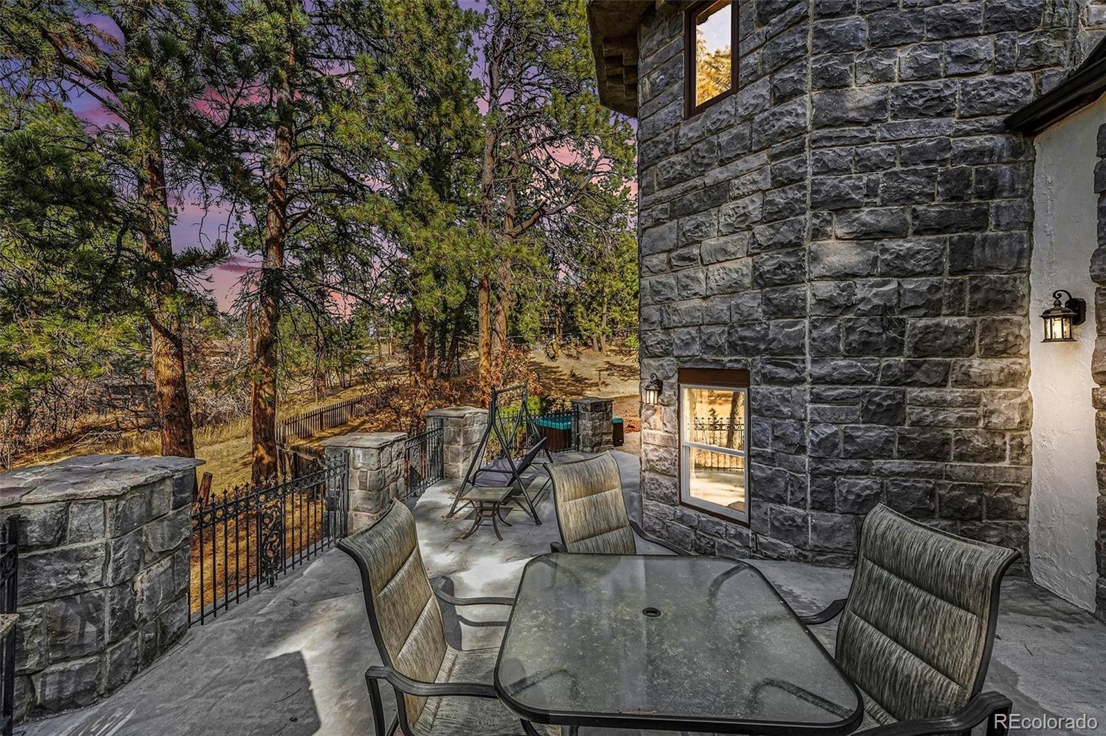 6650 North Village Road Parker, CO 80134 - Photo 37 of 46 a backyard of a house with outdoor seating