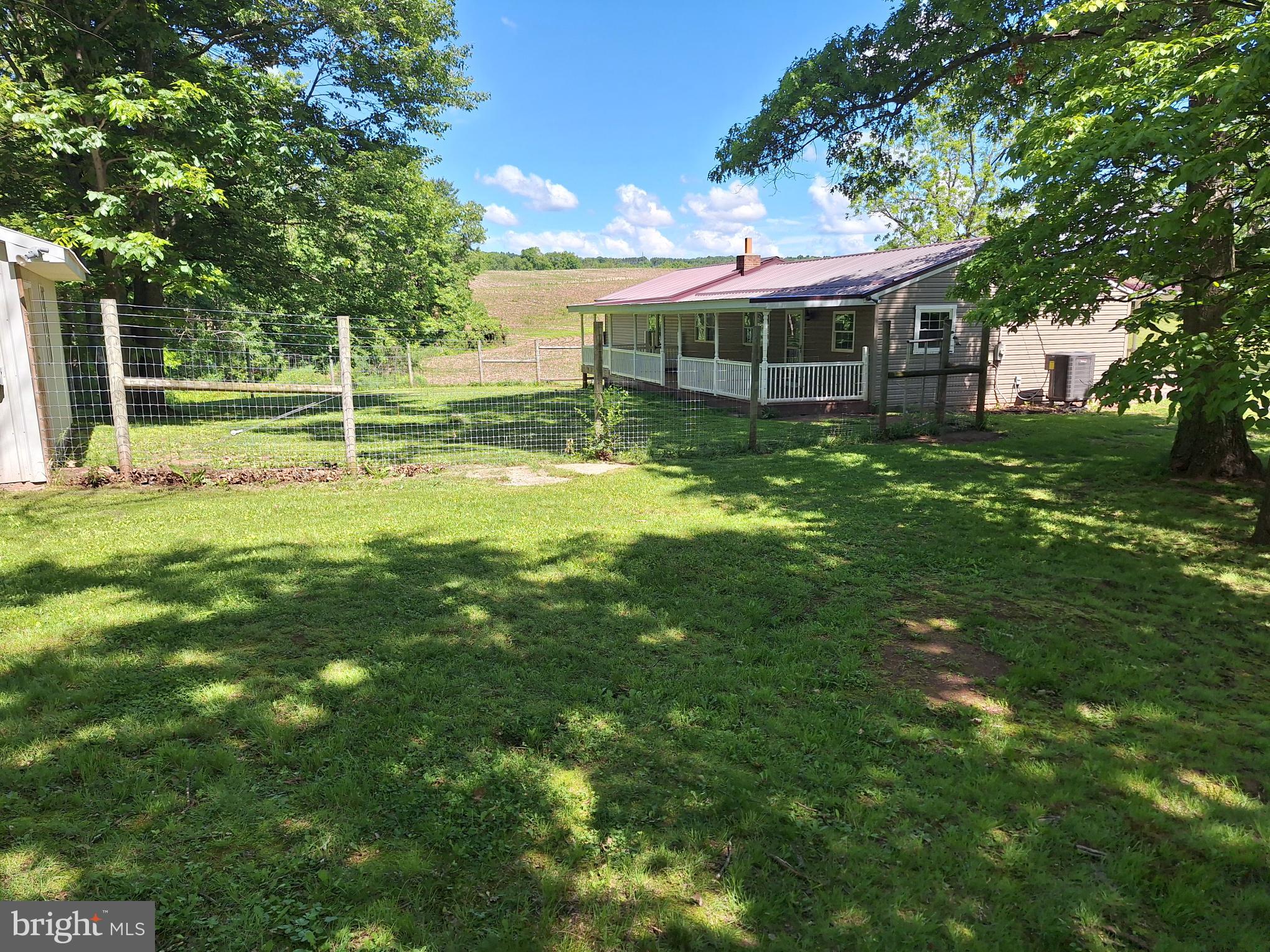 7968 Cromwell Road Three Springs, PA 17264 - Photo 4 of 16 Fenced in portion of back yard & covered back deck
