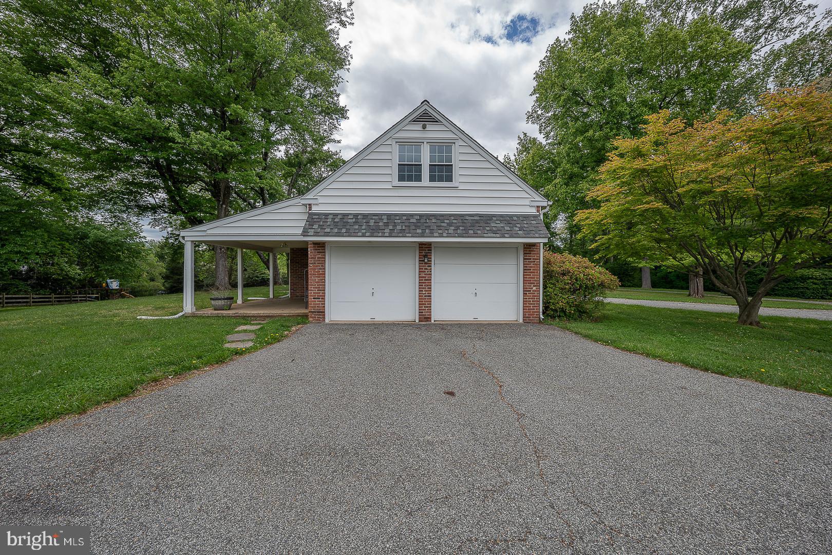 538 Conestoga Road Villanova, PA 19085 - Photo 36 of 39 a front view of a house with a yard