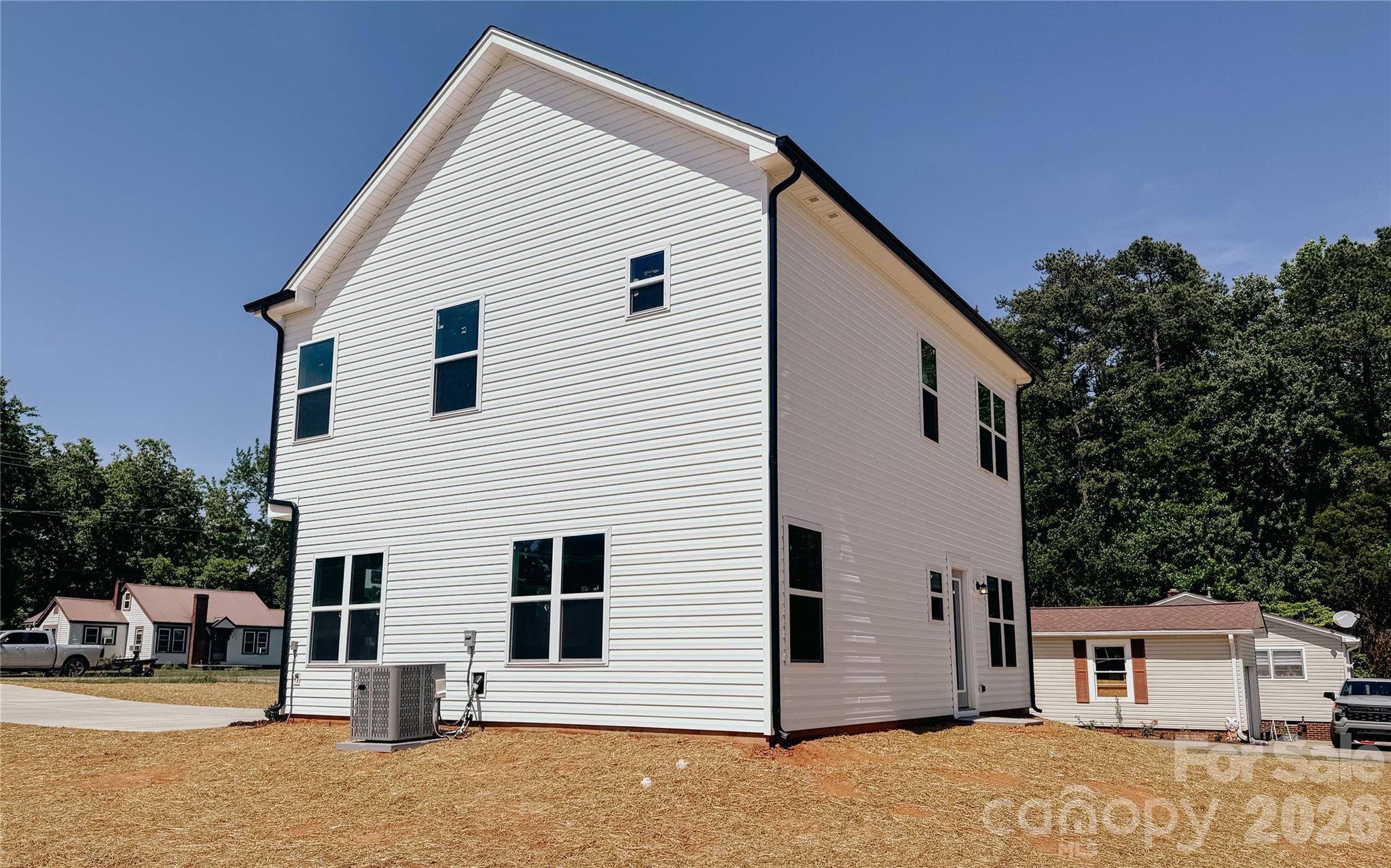 1455 West Ridge Road Salisbury, NC 28147 - Photo 22 of 26 a view of a house with a backyard
