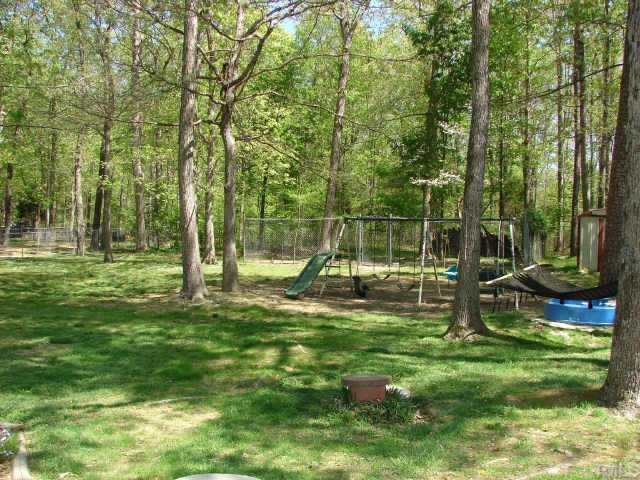 5620 Roslyn Road Durham, NC 27712 - Photo 9 of 10 Now this yard has plenty of space to play, a fenced-in area for pets & lots of potential...