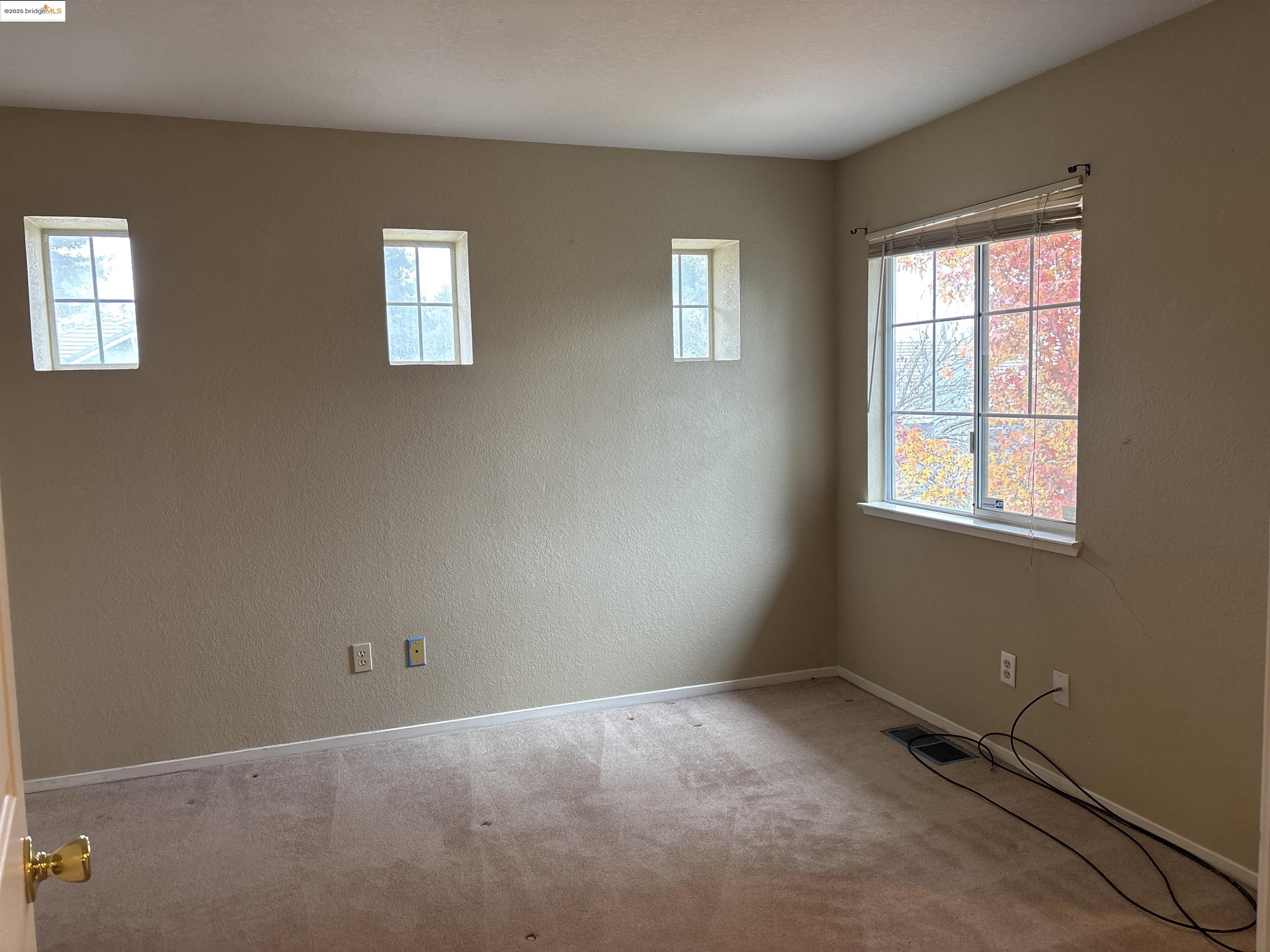 4612 Morningstar Lane Salida, CA 95368 - Photo 11 of 13 a view of an empty room with a window