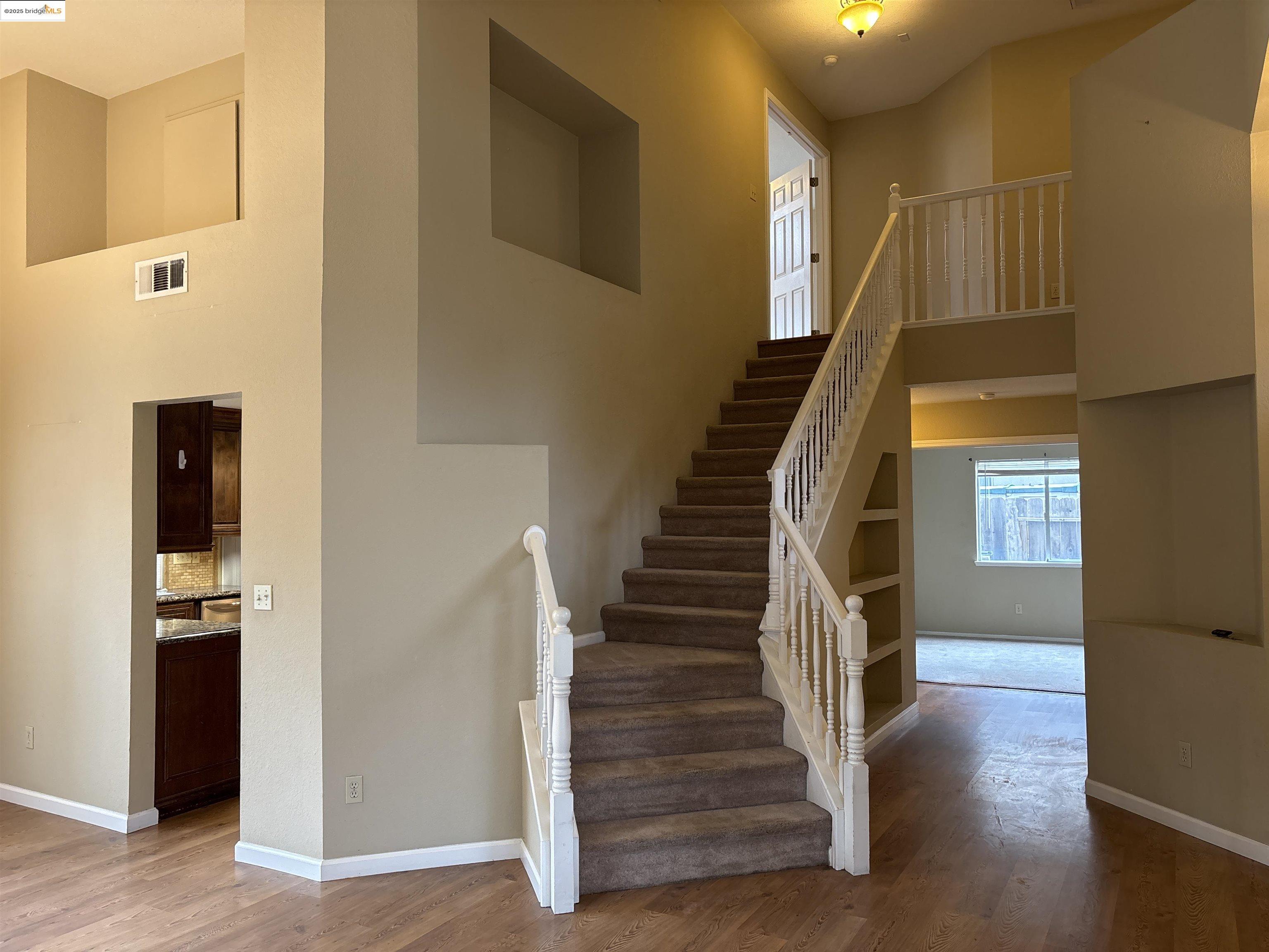 4612 Morningstar Lane Salida, CA 95368 - Photo 7 of 13 a view of entryway and hall with wooden floor