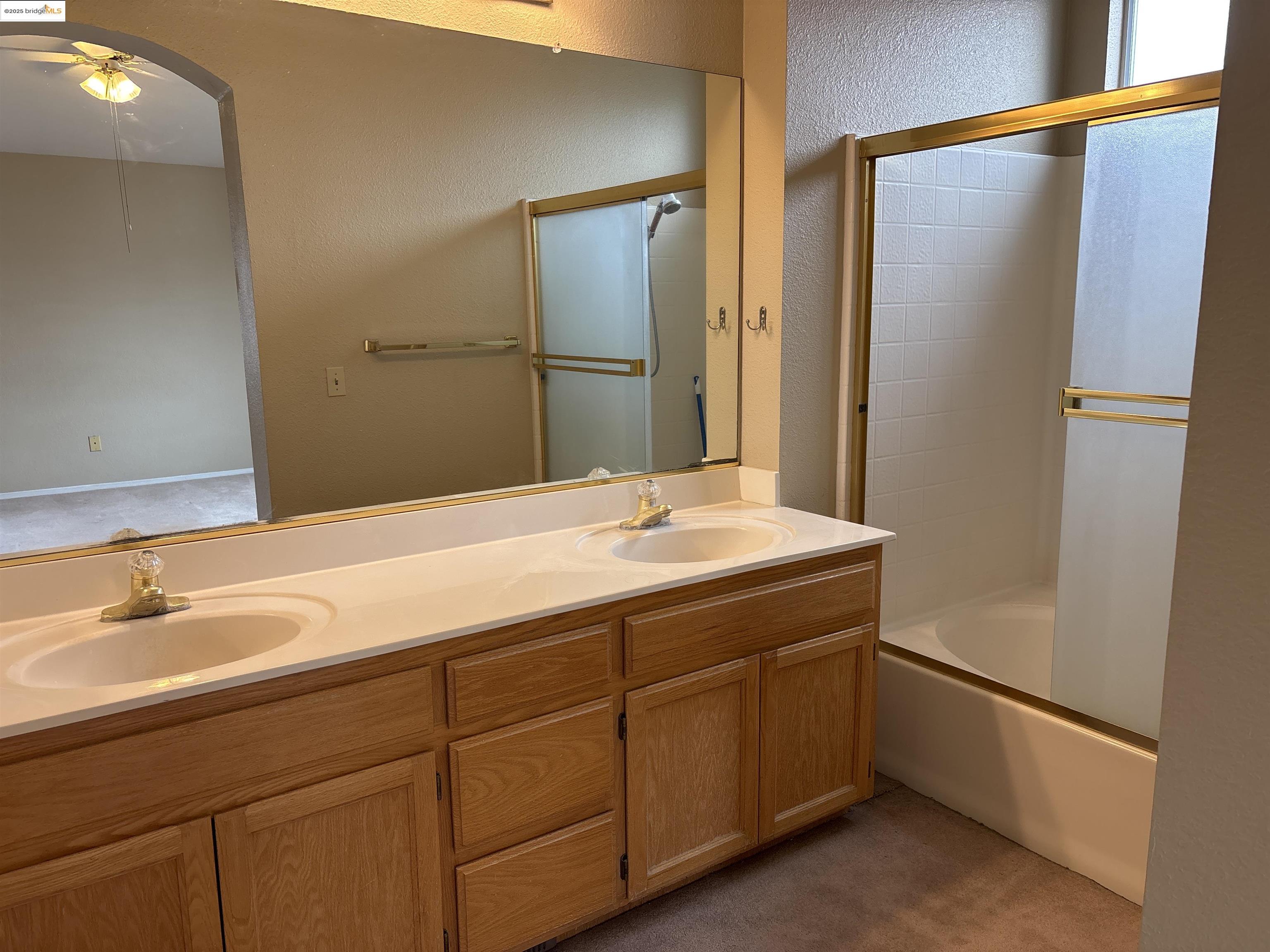 4612 Morningstar Lane Salida, CA 95368 - Photo 8 of 13 a bathroom with a sink and a mirror