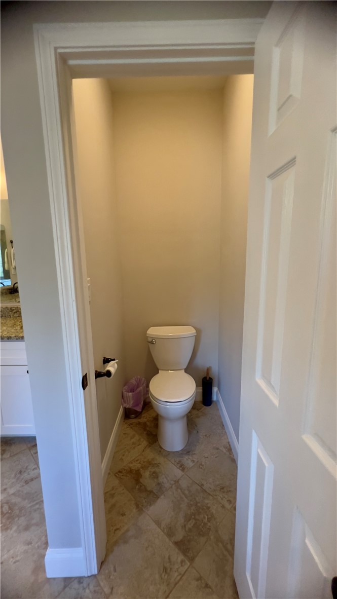 160 Hudgins Lake Road Townville, SC 29689 - Photo 21 of 41 Tiled flooring and a practical toilet complete this efficient lavatory space.