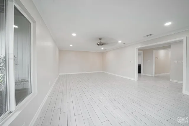 a kitchen with stainless steel appliances granite countertop a stove a sink dishwasher a refrigerator and a oven