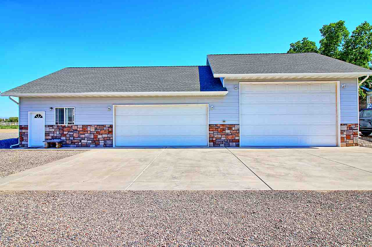 1724 K K 3/4 Road Fruita, CO 81521 - Photo 35 of 42 front view of a house