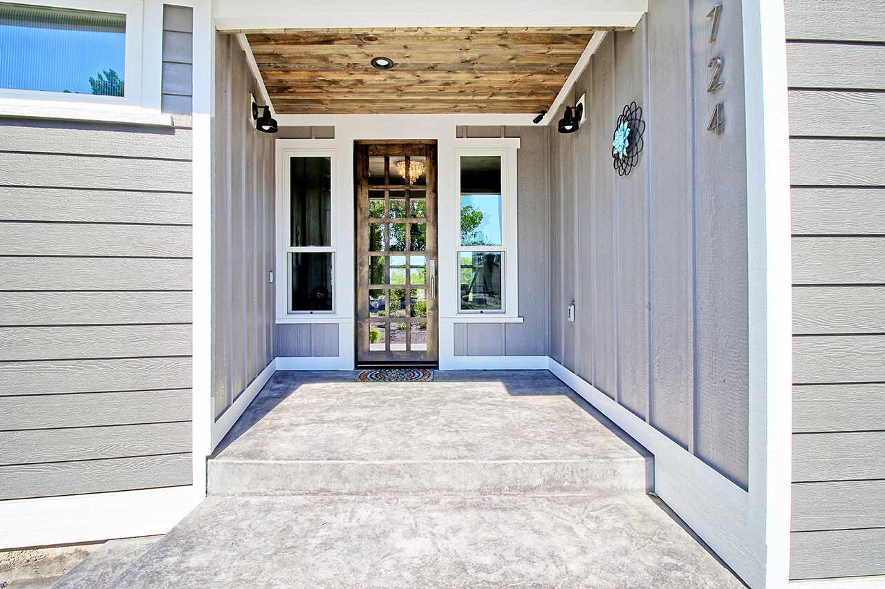 1724 K K 3/4 Road Fruita, CO 81521 - Photo 4 of 42 a view of a entryway door of the house