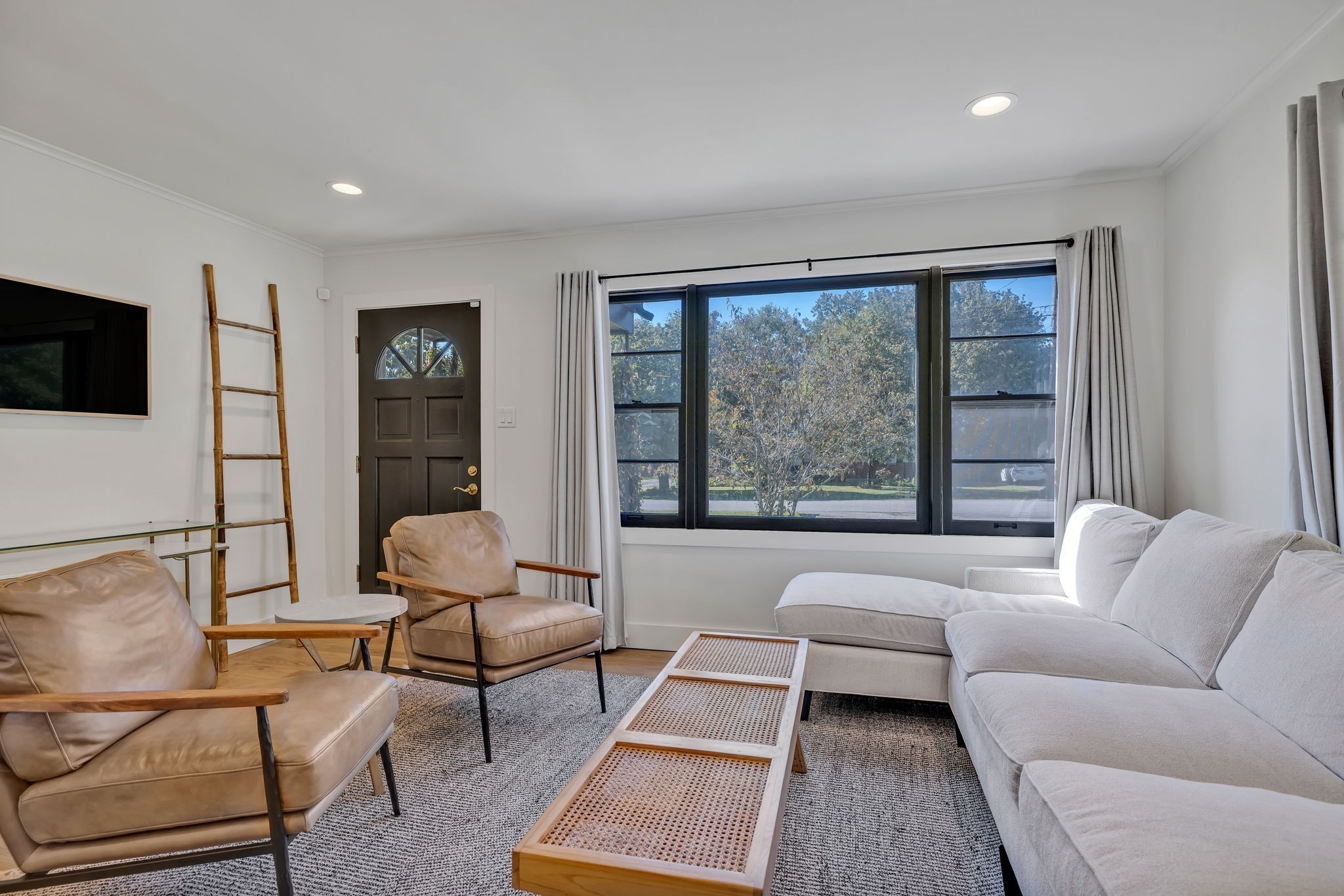 313 James Avenue Franklin, TN 37064 - Photo 15 of 49 a living room with furniture and a flat screen tv