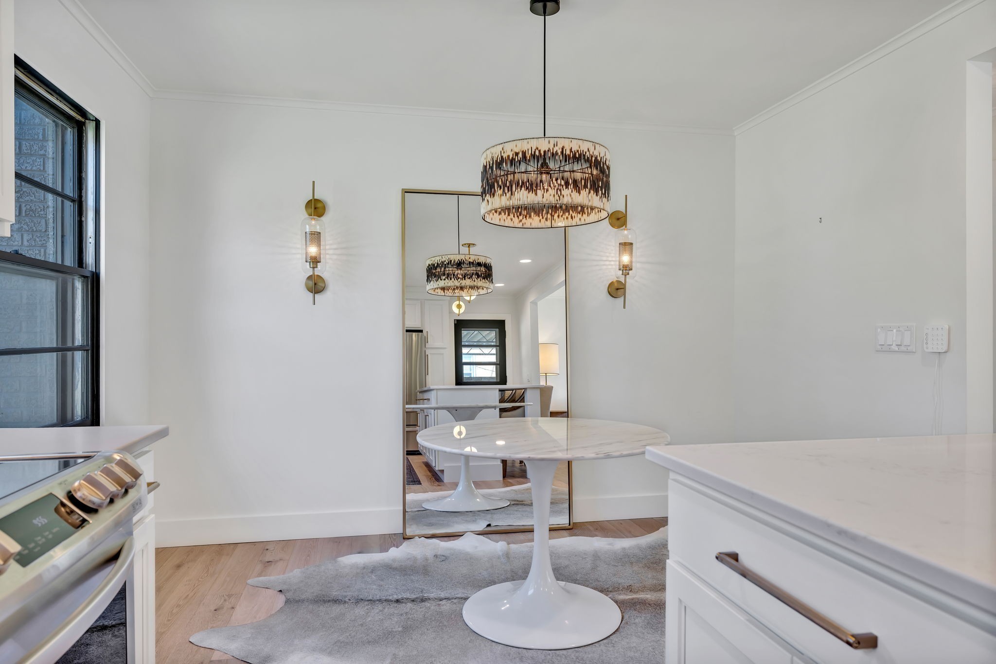 313 James Avenue Franklin, TN 37064 - Photo 29 of 49 a living room with furniture and a chandelier