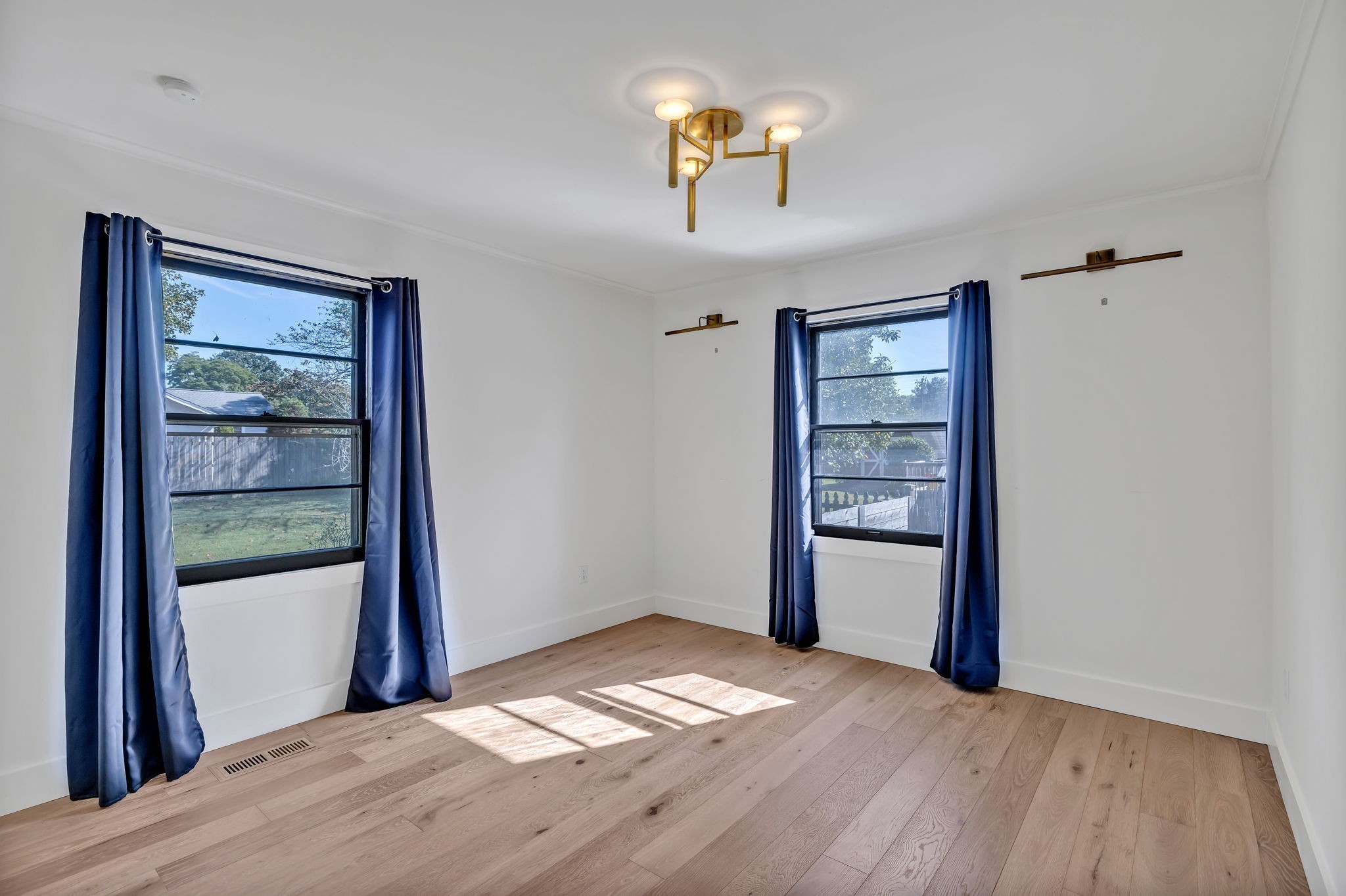 313 James Avenue Franklin, TN 37064 - Photo 34 of 49 a view of empty room with wooden floor and fan