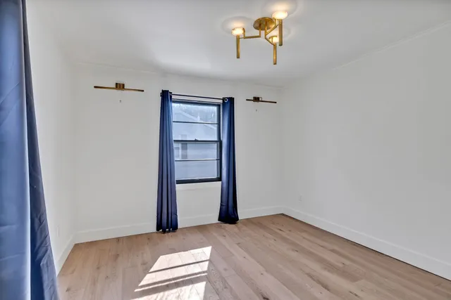 a view of empty room with a window